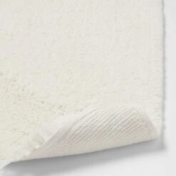 18"x32" Plush Half Moon Bath Rug Cream - Threshold™ -Threshold Shop GUEST b5d50f45 45a6 457d a95b a56d57941d2e